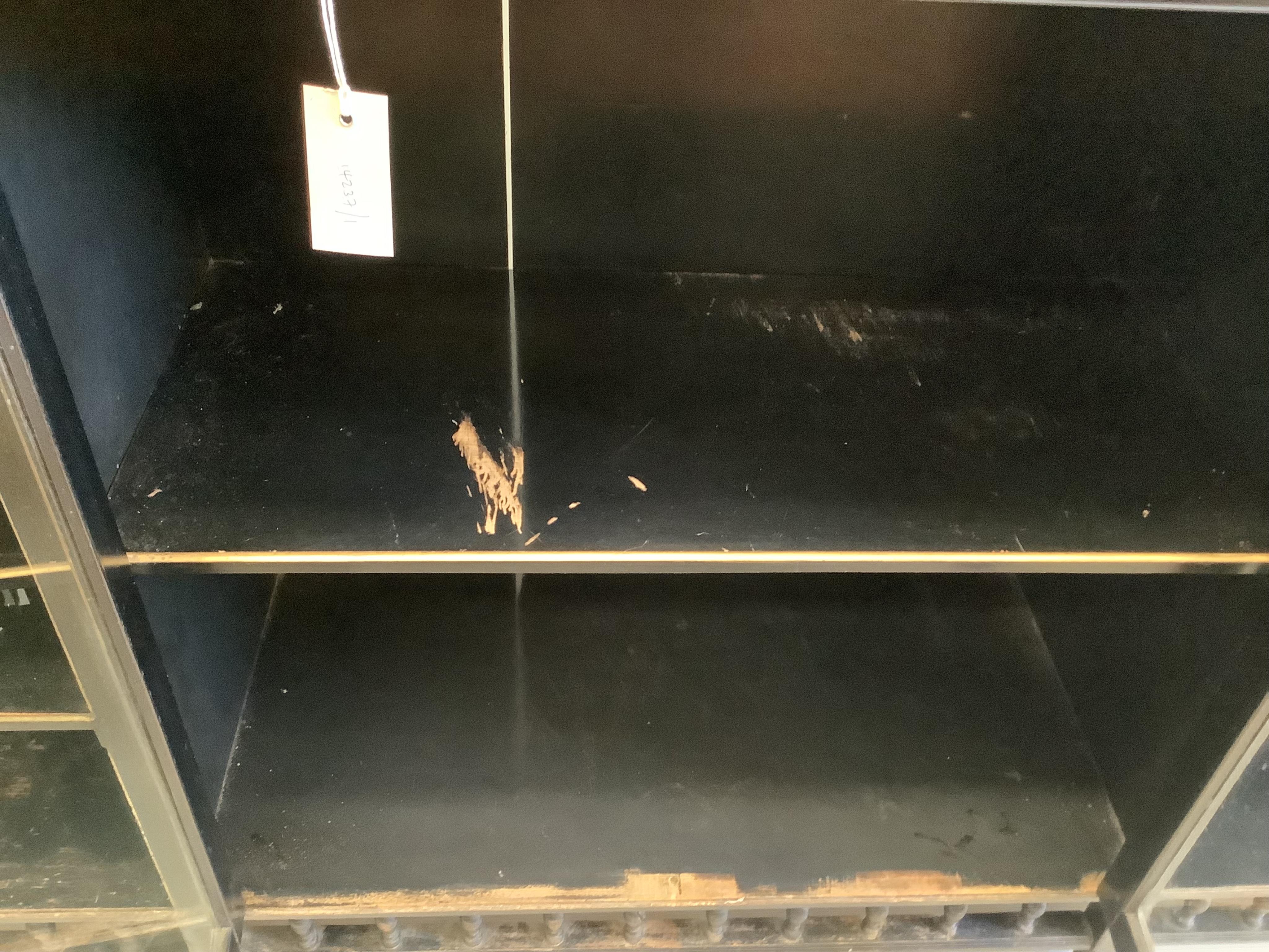 A late Victorian Aesthetic Movement ebonised side cabinet, width 167cm, depth 43cm, height 105cm. Condition - poor